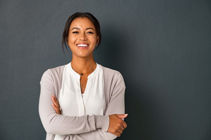 woman smiling arms crossed